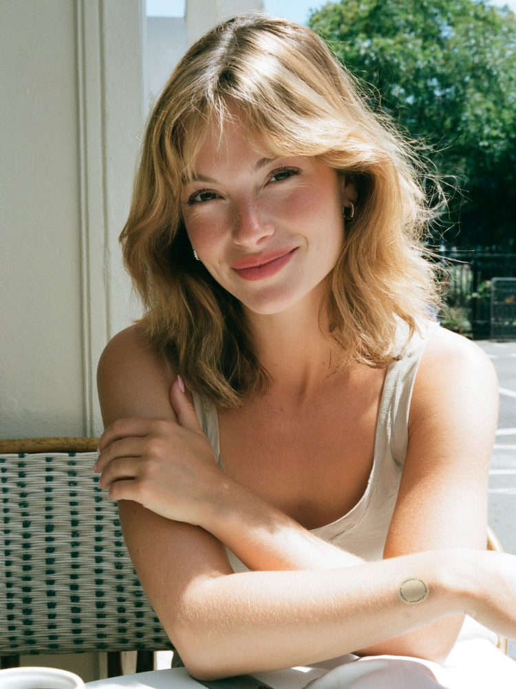 Happy customer holding product